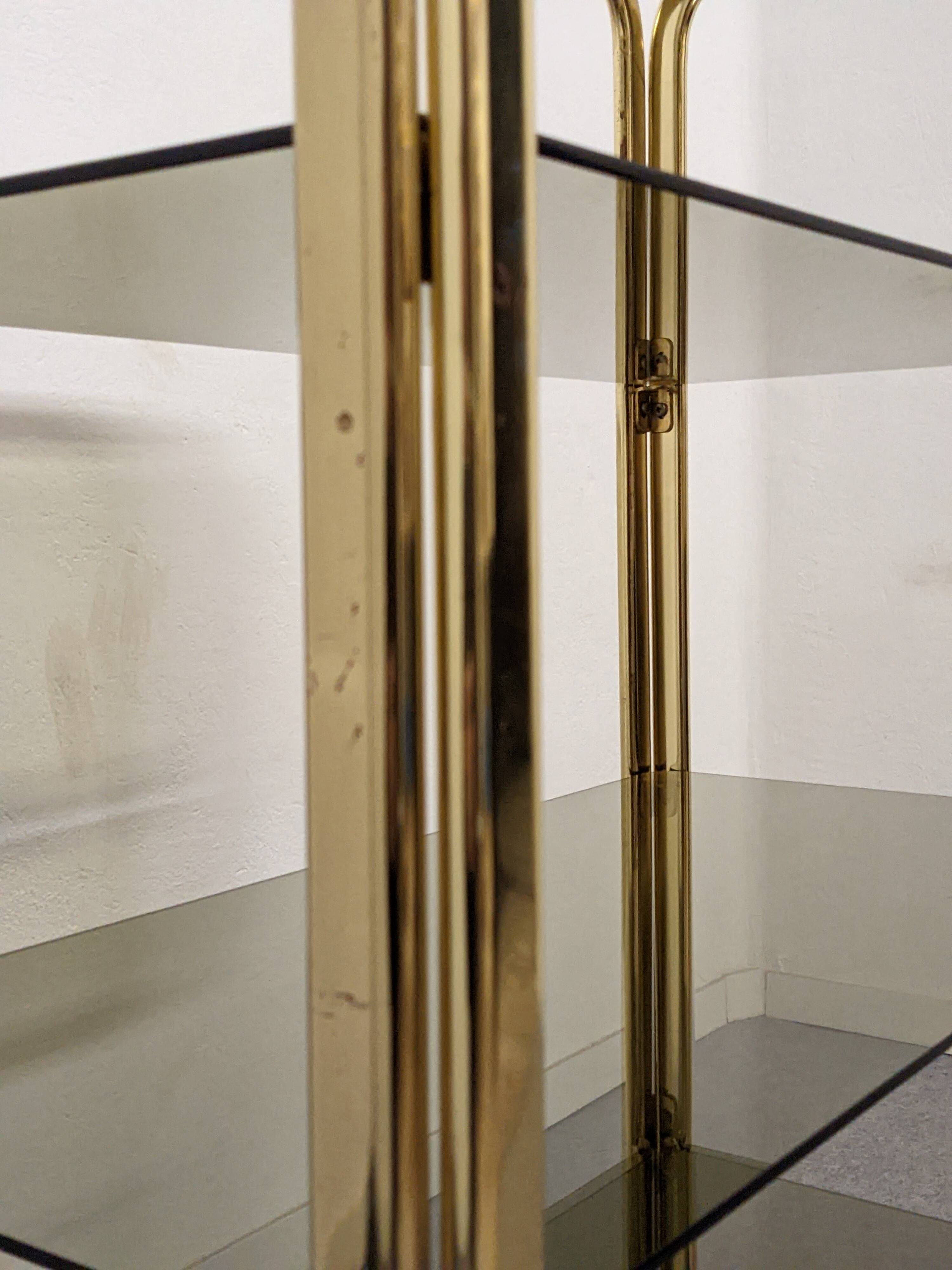 Hollywood Regency gilt metal and smoked glass shelf, Italy circa 1970