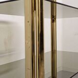 Hollywood Regency gilt metal and smoked glass shelf, Italy circa 1970