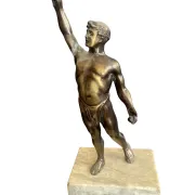 Antique bronze sculpture on a marble base, Roaring Twenties, around 1930.