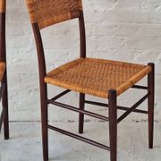 Four teak dining chairs with patinated cane after Gio Ponti, Italy 1960s