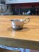small silver-plated metal cup
