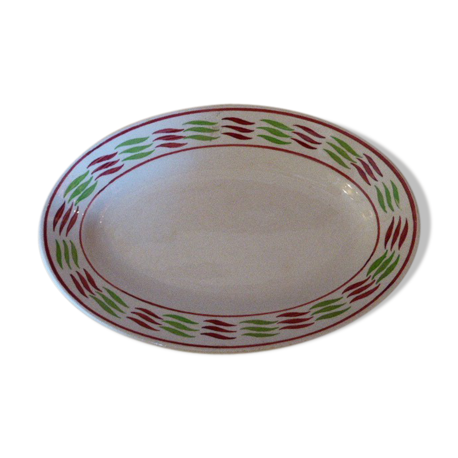 Service dish, in earthenware geometric patterns red and vintage green, stamped KG Luneville
