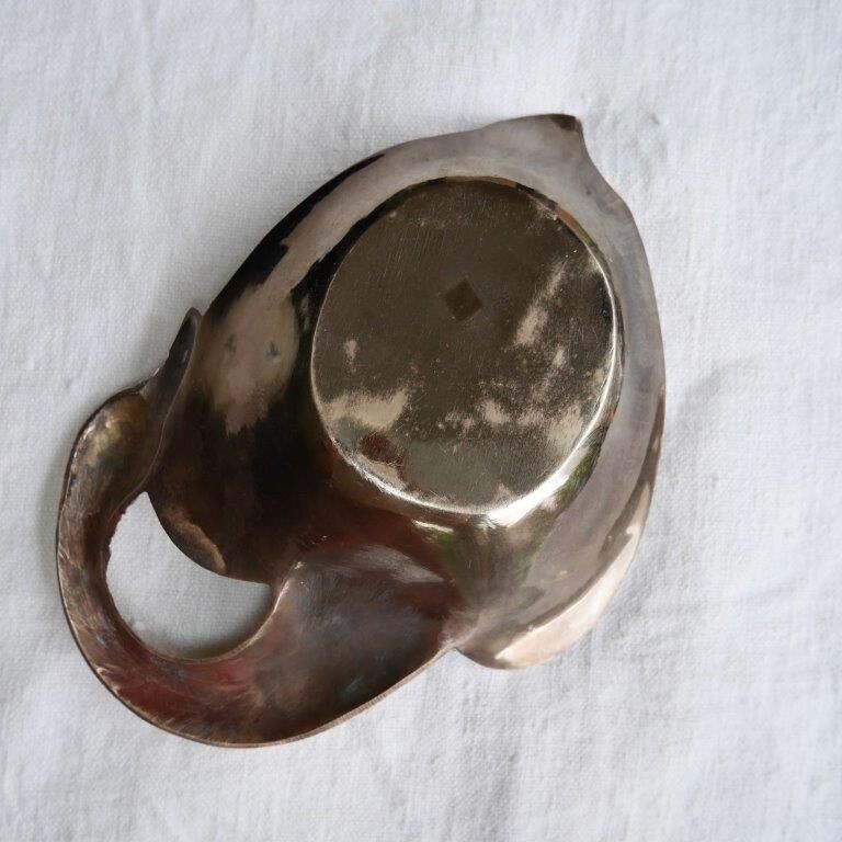 Brass swan pocket empty