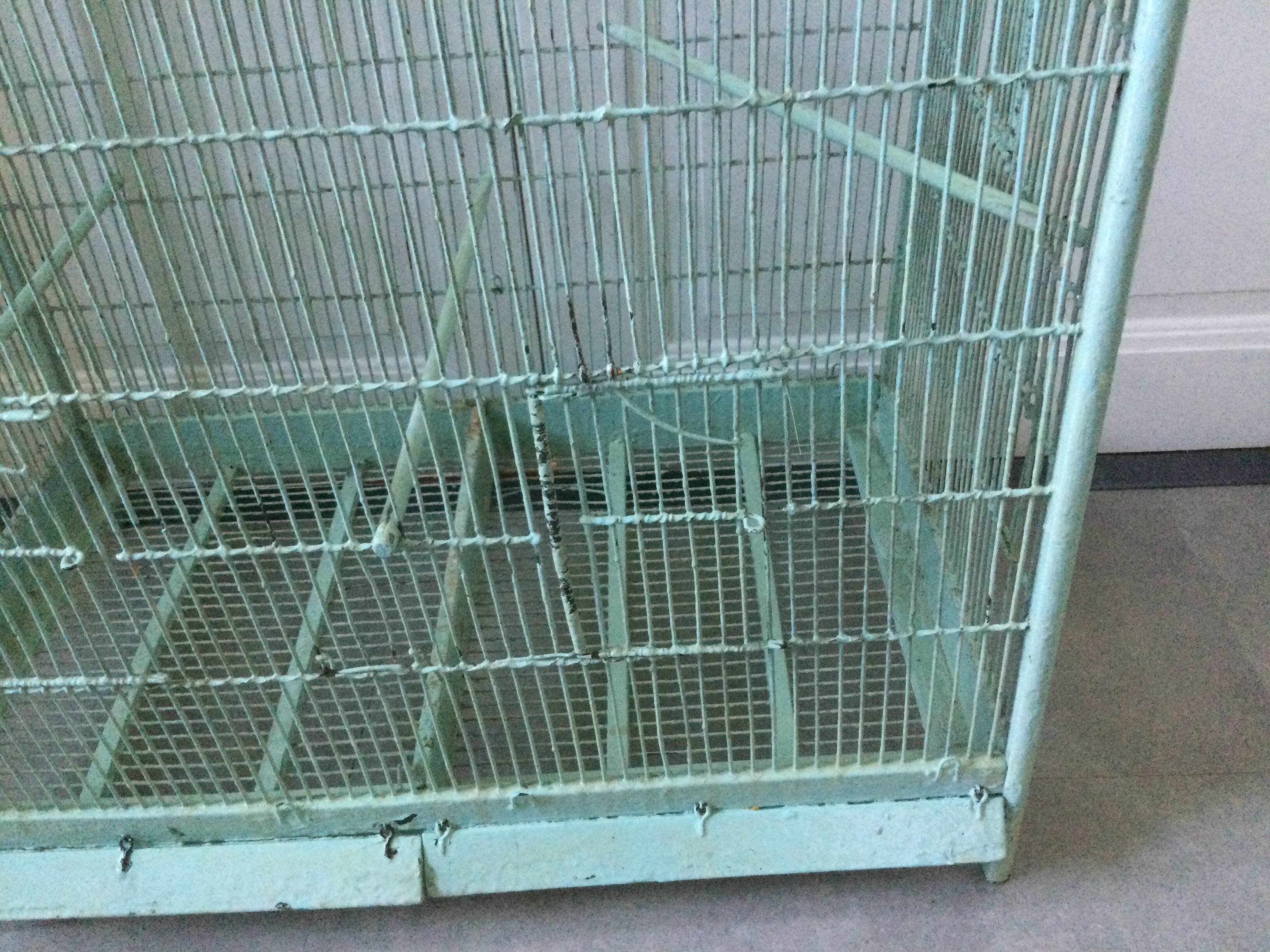 Old wooden and metal birdcage