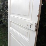 Communication door H220xW80.5cm, old panelled with moulding.