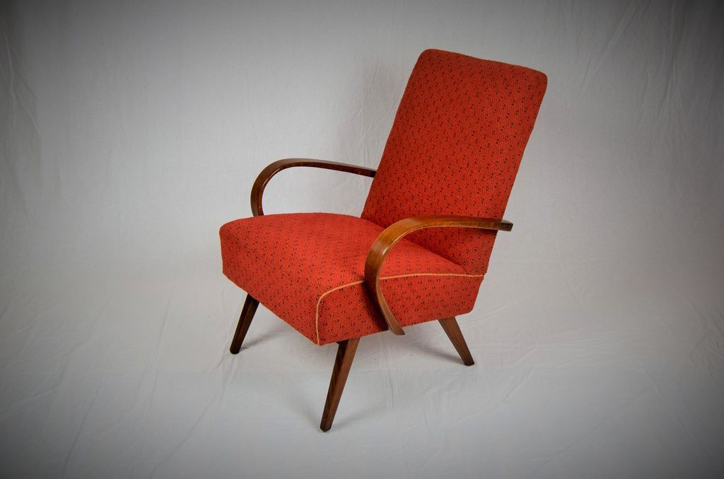 Curved wooden armchair from Ton 1960