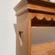 Wall shelf in raw wood with drawers and openwork hearts