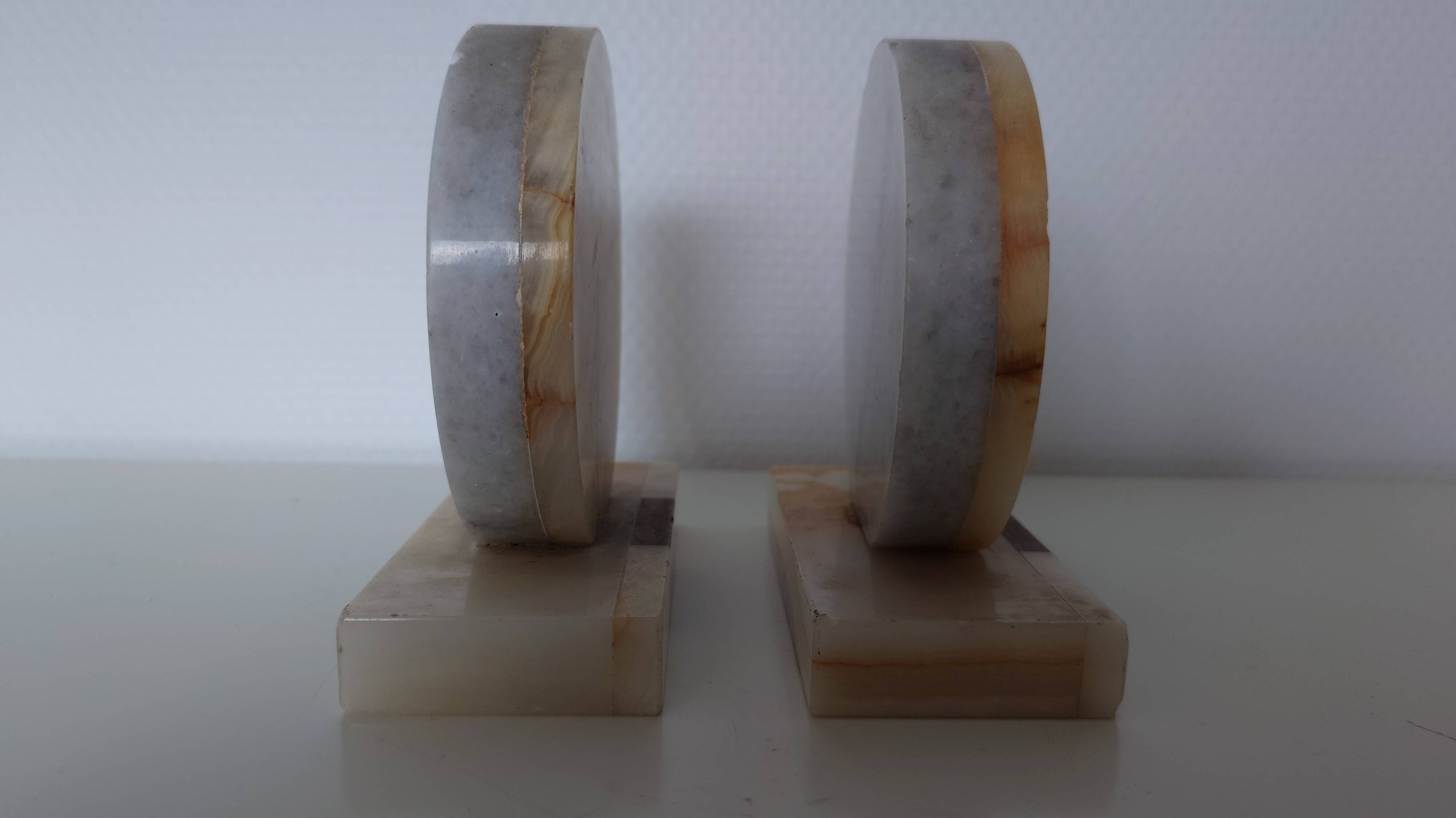Pair of marble and onyx bookends, geometric design, Art Deco style.