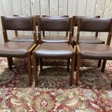 Série de 6 chaises dans le goût de Regain assises cuir