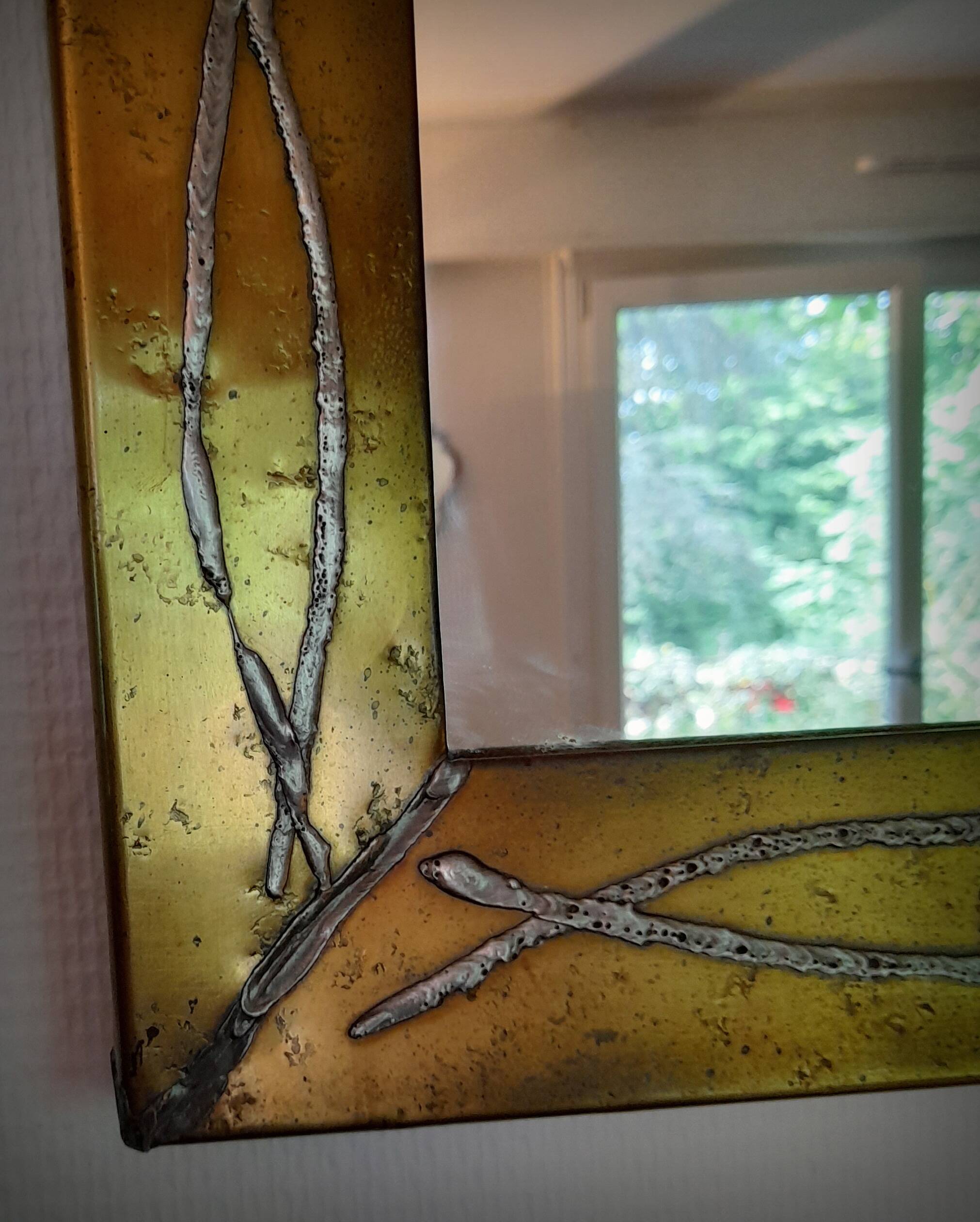 Brutalist brass mirror by Jean Goardere, France, 1970s