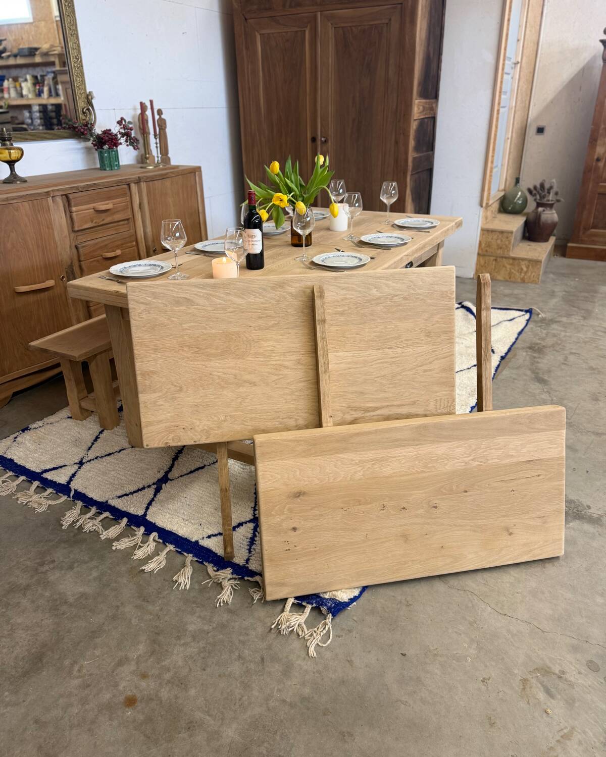 Solid oak extendable farmhouse table with 2 drawers.