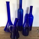 Series of five bottles / jars of cobalt blue apothecary