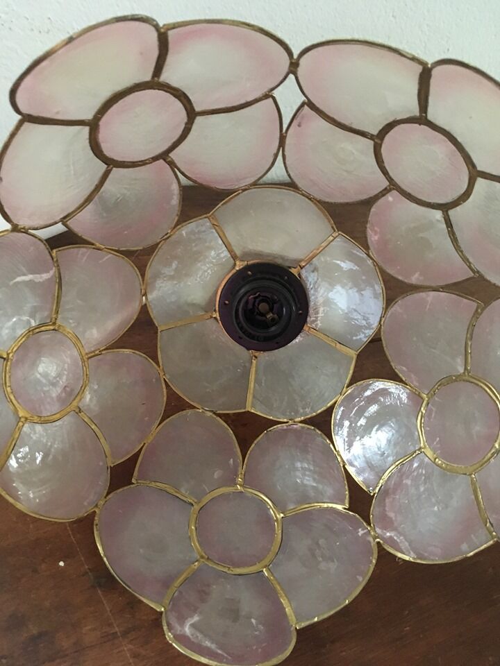 Suspension in pink mother-of-pearl and brass