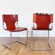 Pair of chairs in leather and chrome tube