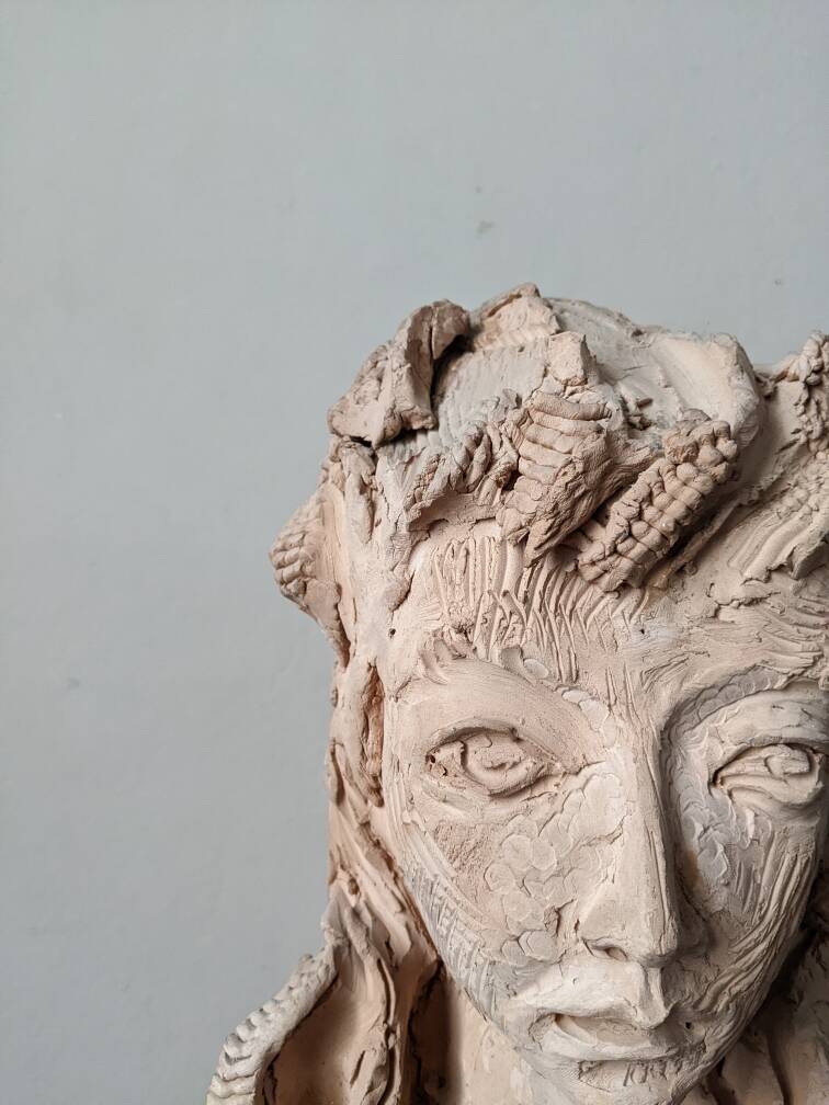 Handmade clay terracotta sculpture head decoration workshop