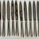 12 silver-plated metal knives