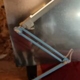 Articulated blue desk lamp