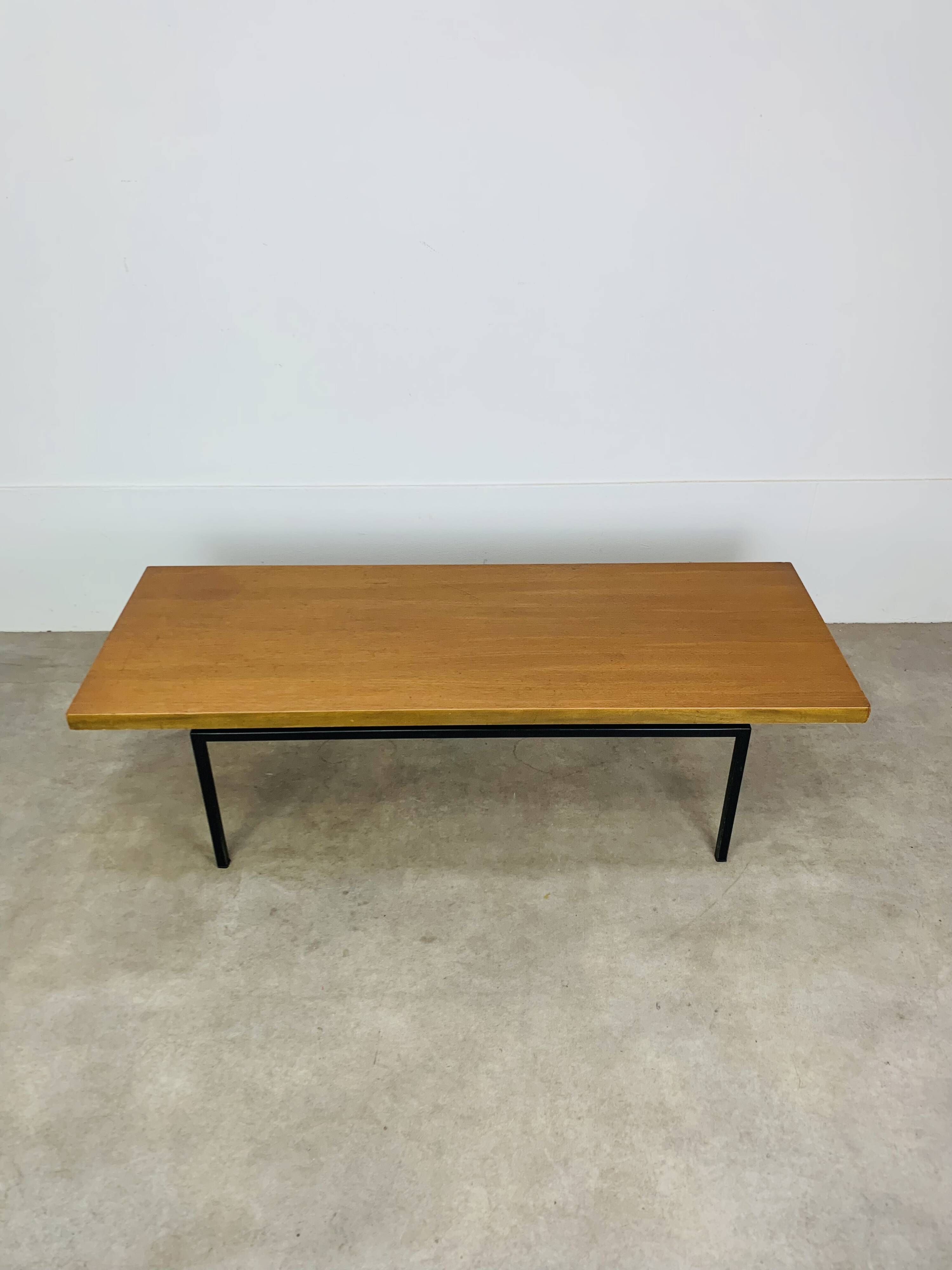 1950s modernist coffee table, wood and black metal.