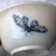 Ramekin in earthenware with decoration of flowers, butterflies and birds