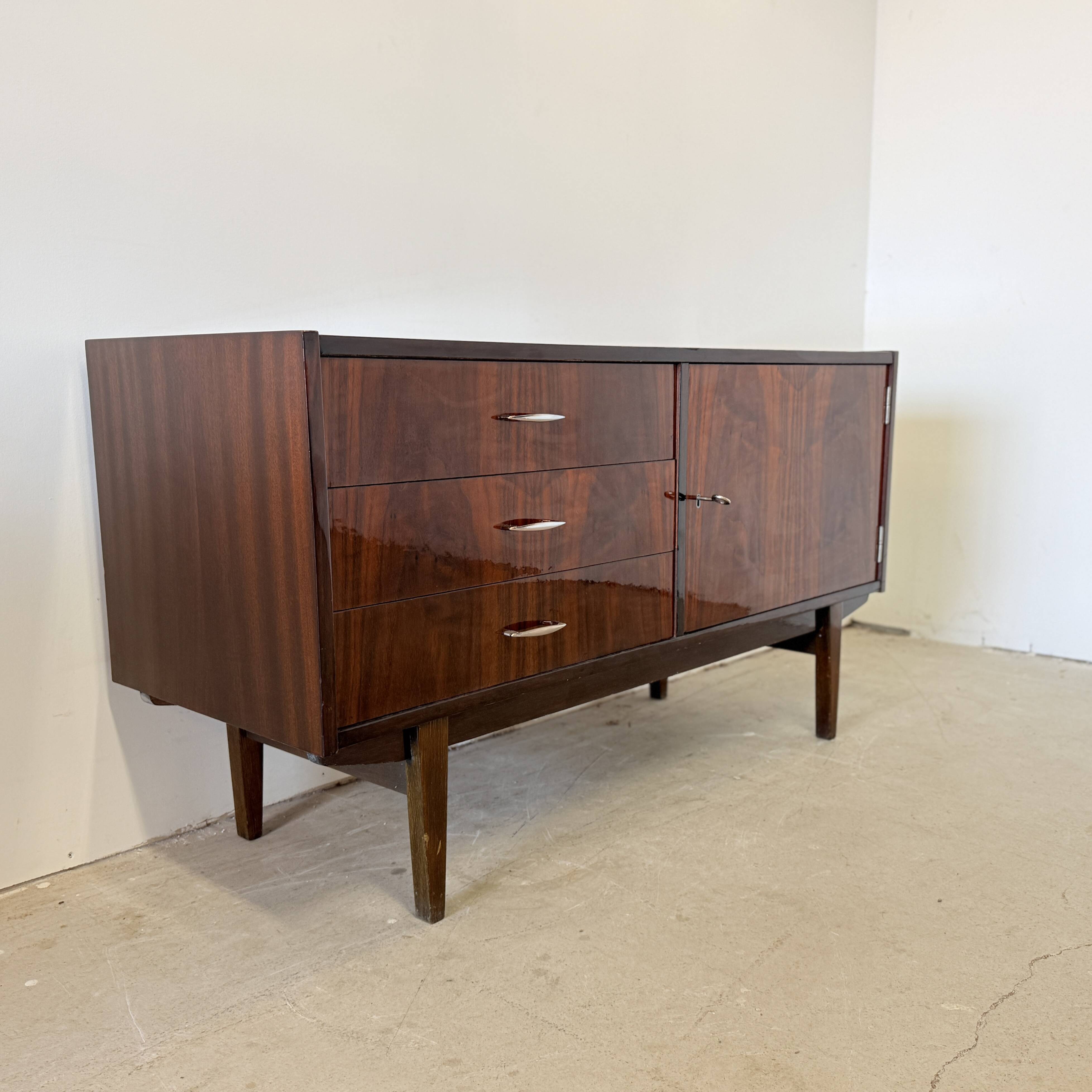 Subtle high-gloss sideboard in Scandinavian style