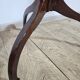 Antique octagonal mahogany side table on a classic tripod, 19th century.
