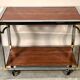 Italian rolling dessert table with two trays decorated with pink travertine