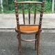 Vintage 19th-century bistro chair in curved solid wood, Thonet style.