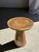 Natural solid suar side table (monoxyle) with a minimal conical base.