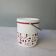 Seau à glaçons blanc vintage en opaline avec motifs rouges