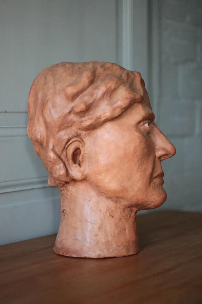 Sculpture signed Doloire, terracotta sculpture, sculpture of a man's head, collection, interior decoration.