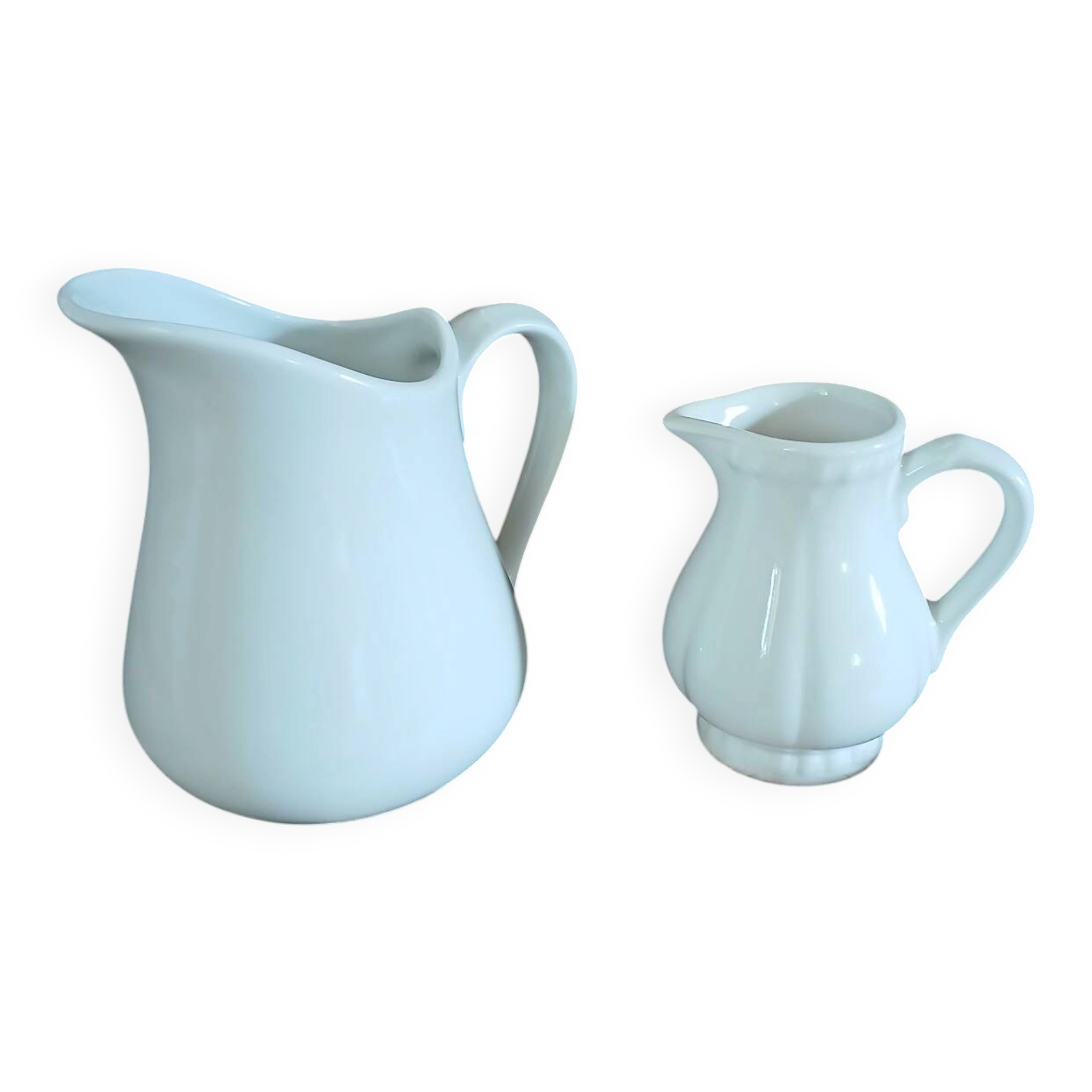 2 antique pitchers in white earthenware
