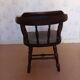 Armchair with wooden armrests