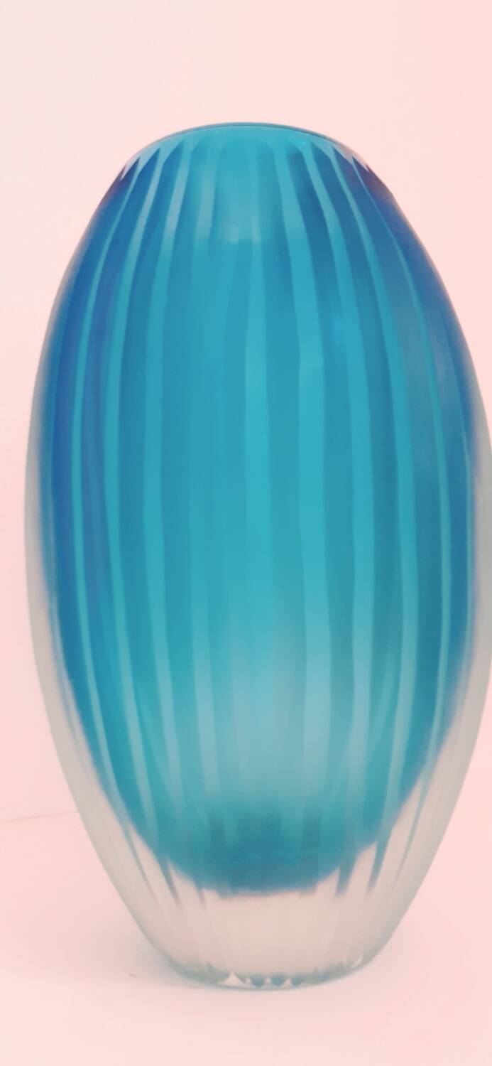 Antique turquoise glass vase
