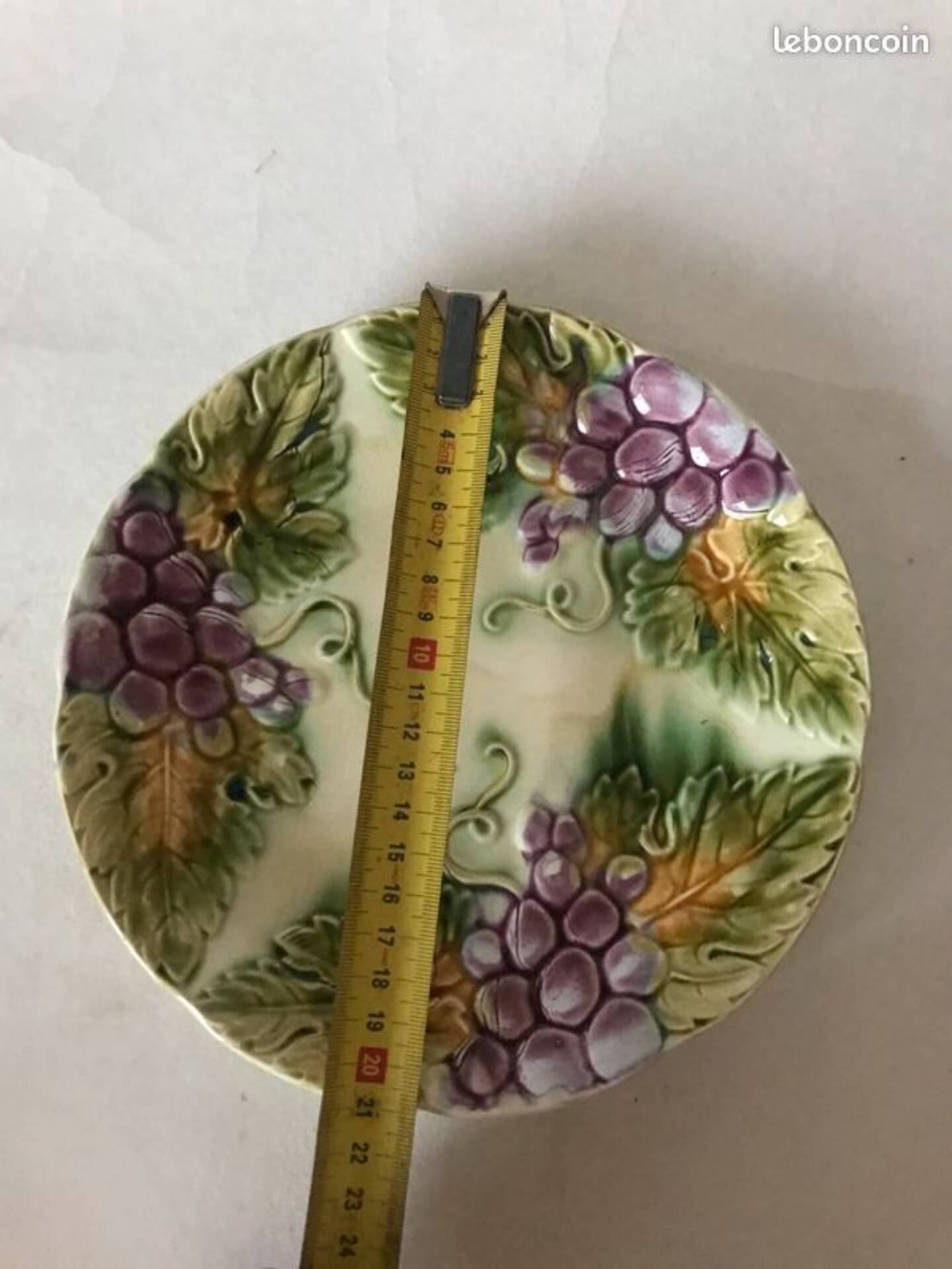 Slipware plates with vine decoration.