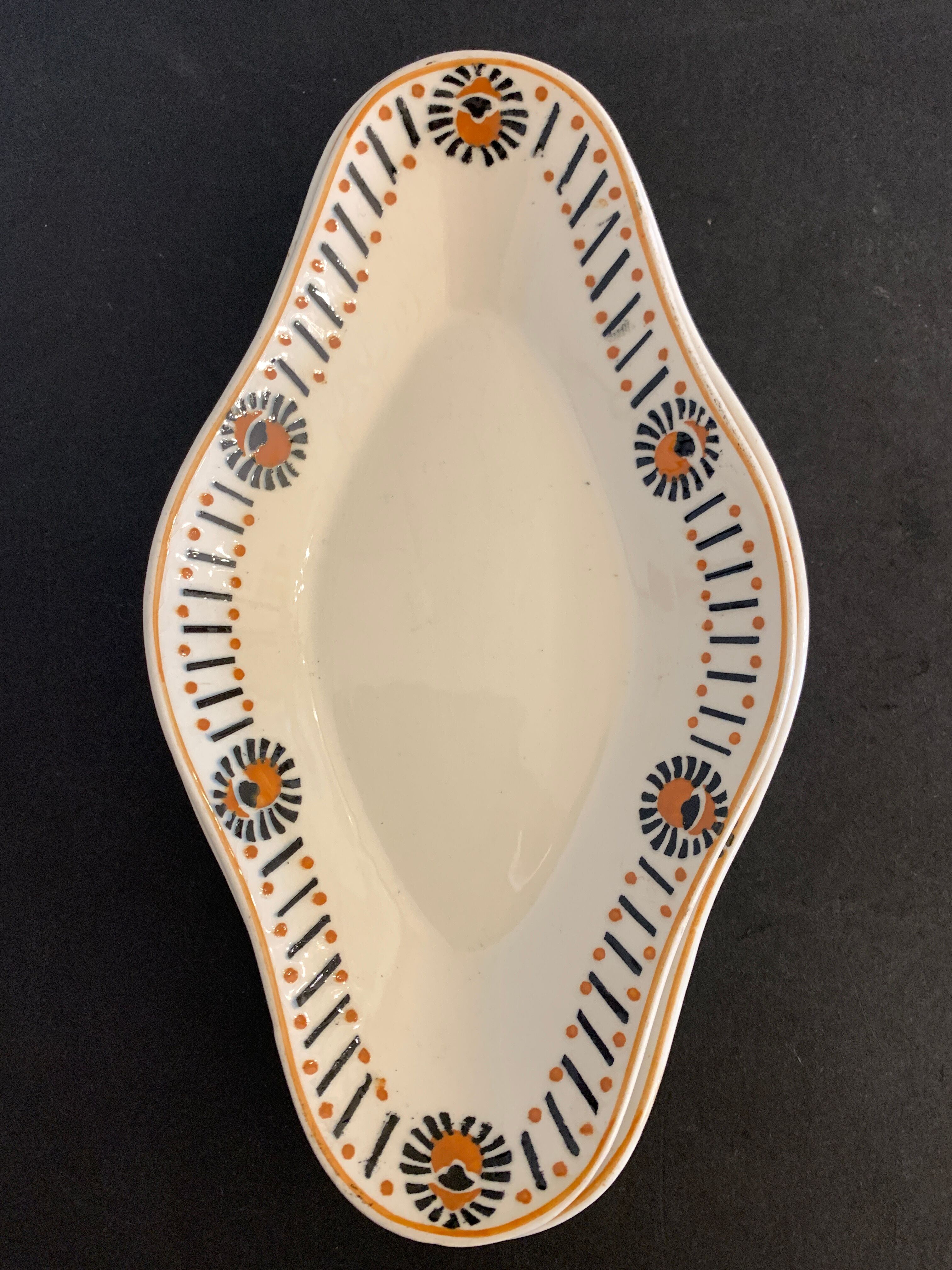 Pair of art deco raviers signed Longwy and numbered, model Gerazine