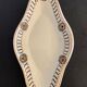 Pair of art deco raviers signed Longwy and numbered, model Gerazine