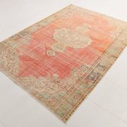 Tapis vintage rouge pâle