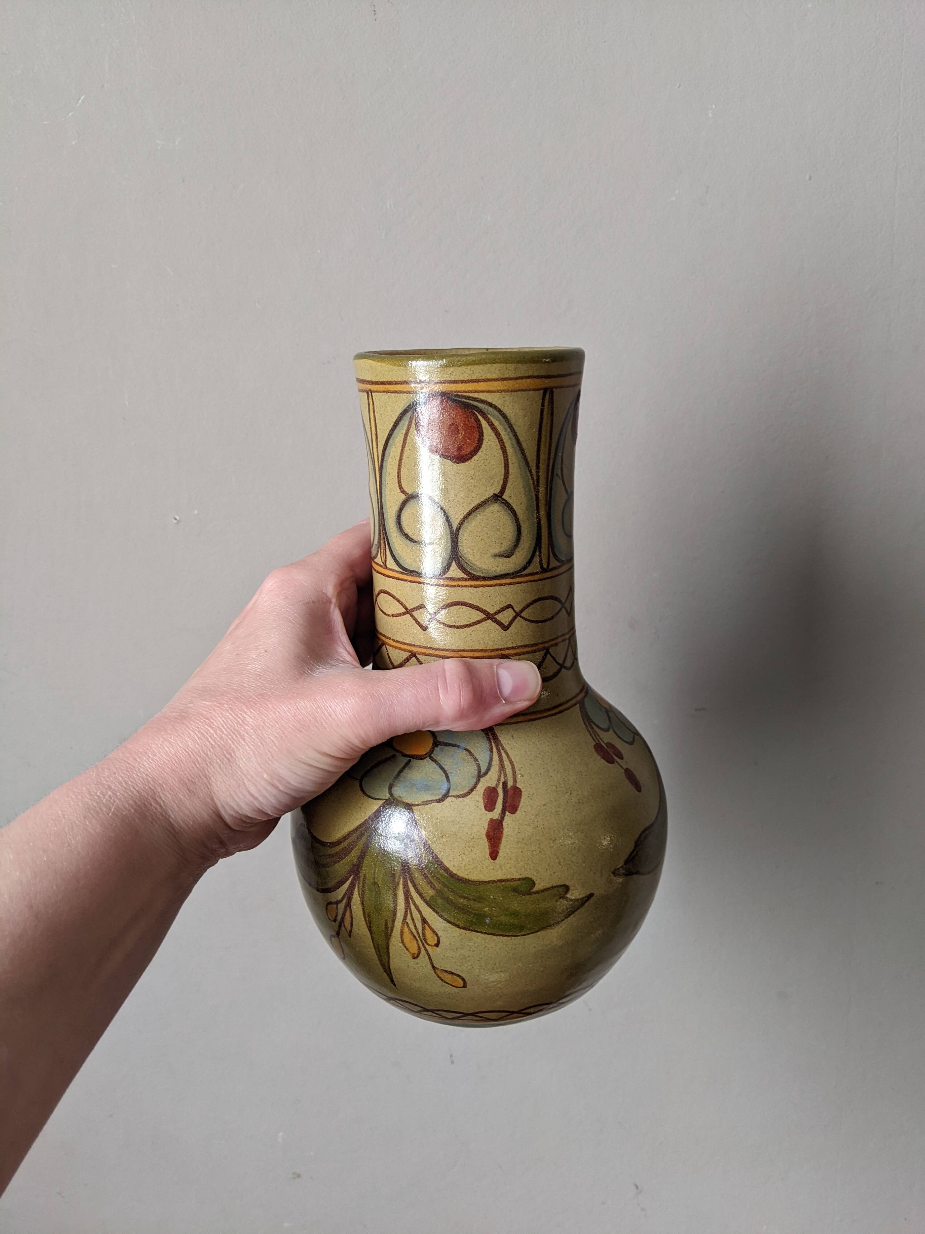 Handcrafted ceramic vase with floral decoration, Portuguese craftsmanship.