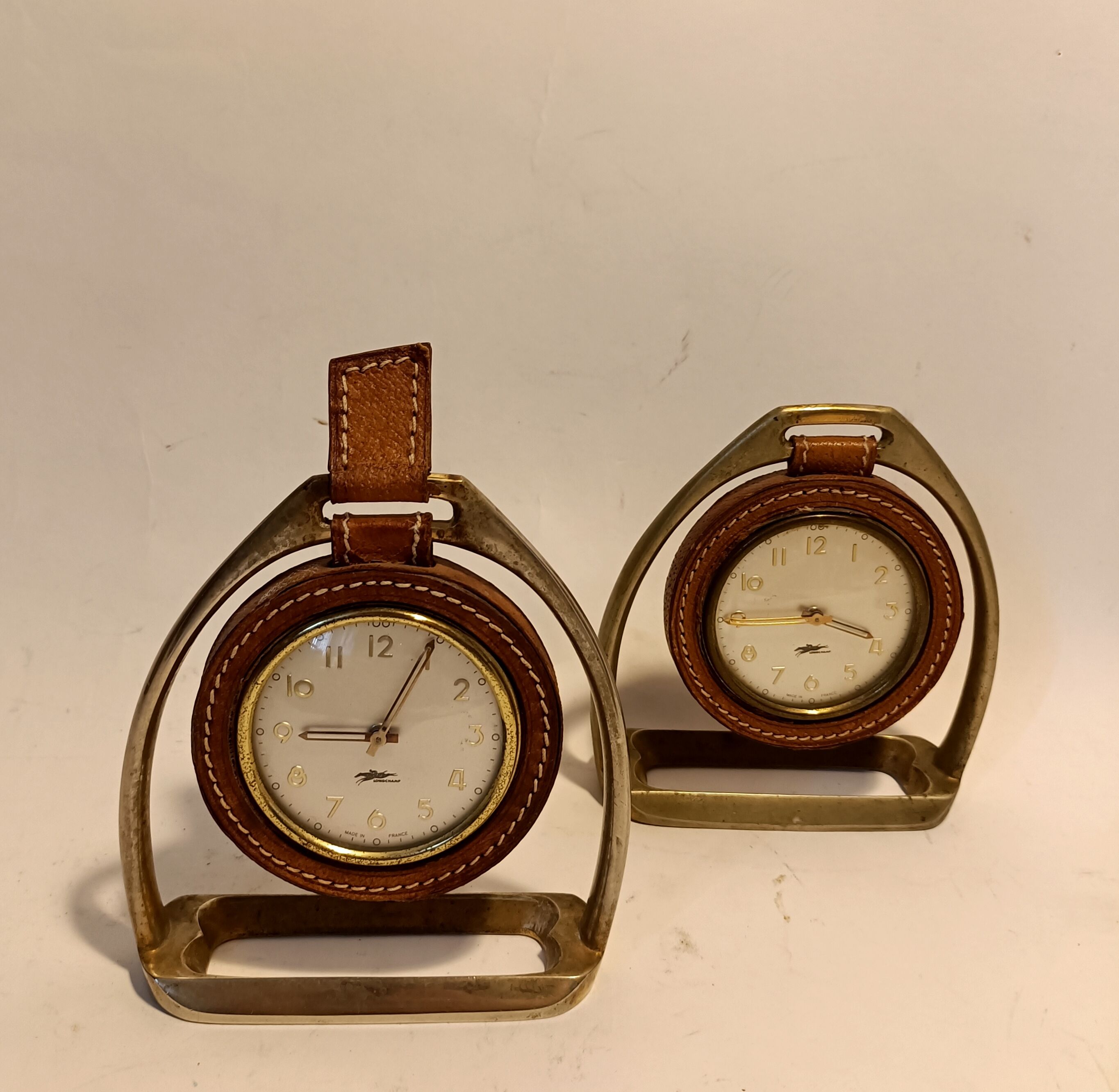 Pair of Longchamps 1960 leather stirrup pendulettes.