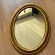 Miroir cadre ovale bois doré