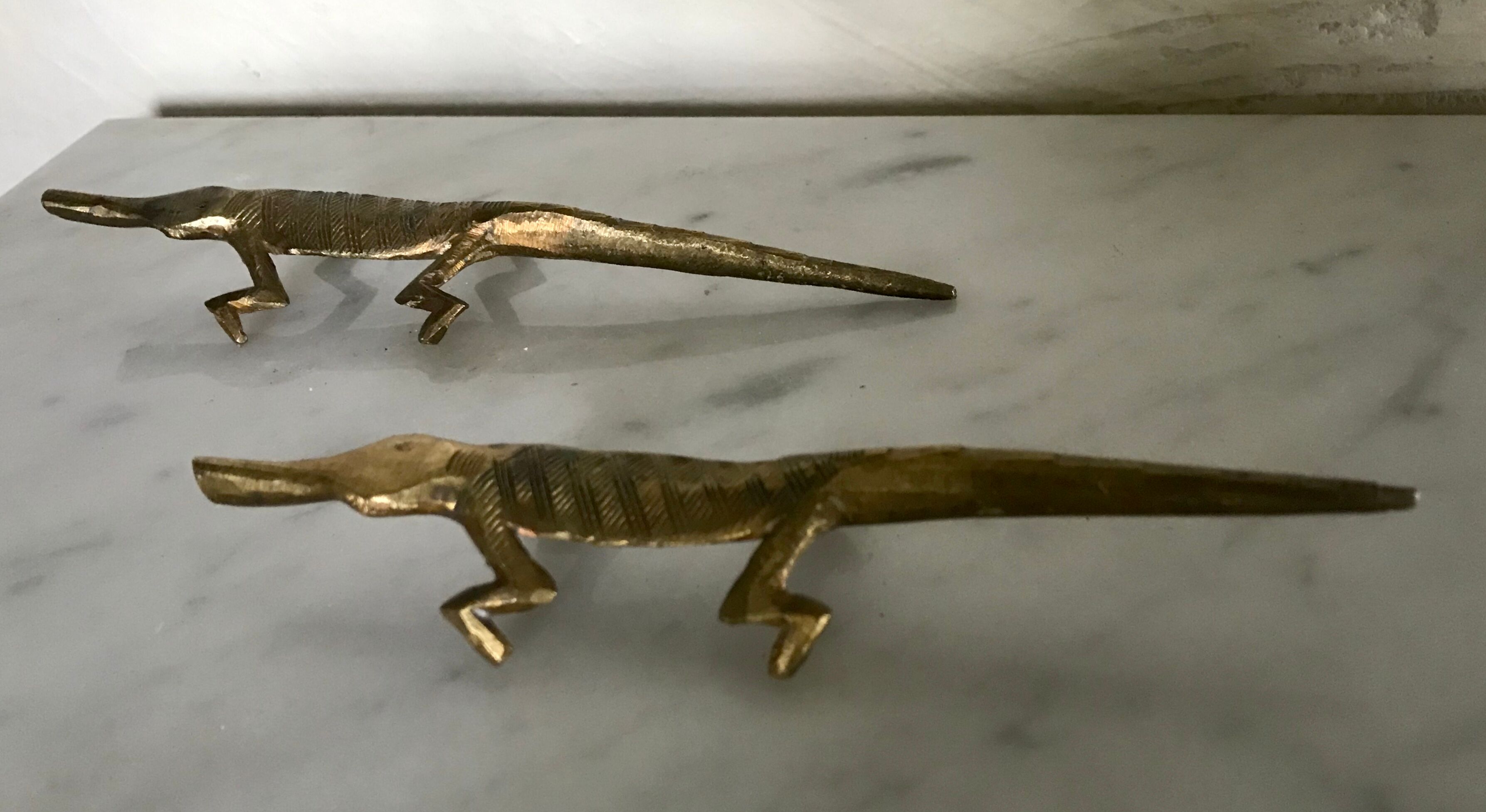 Couple of brass alligators