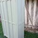 Parisian wardrobe with 2 doors and 3 shelves in Luxembourg green.