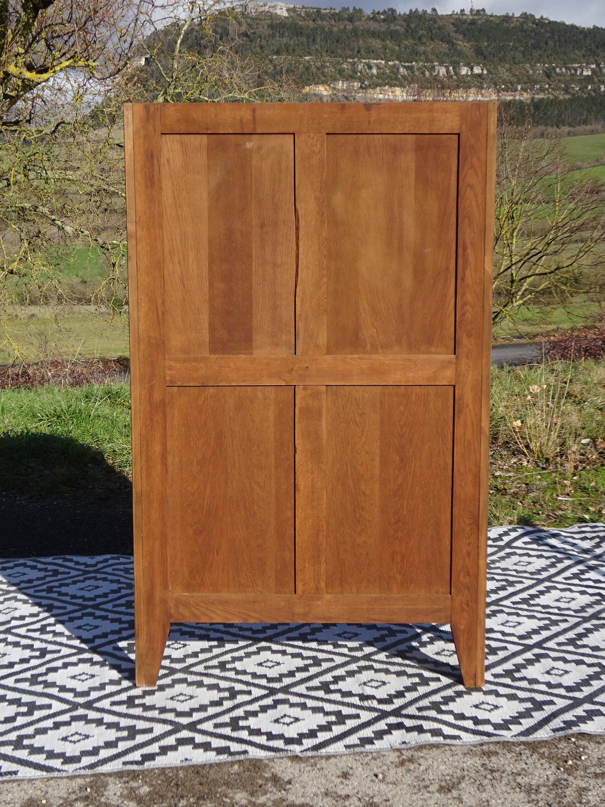 Glass library with rosewood marquetry in the Louis XV style.