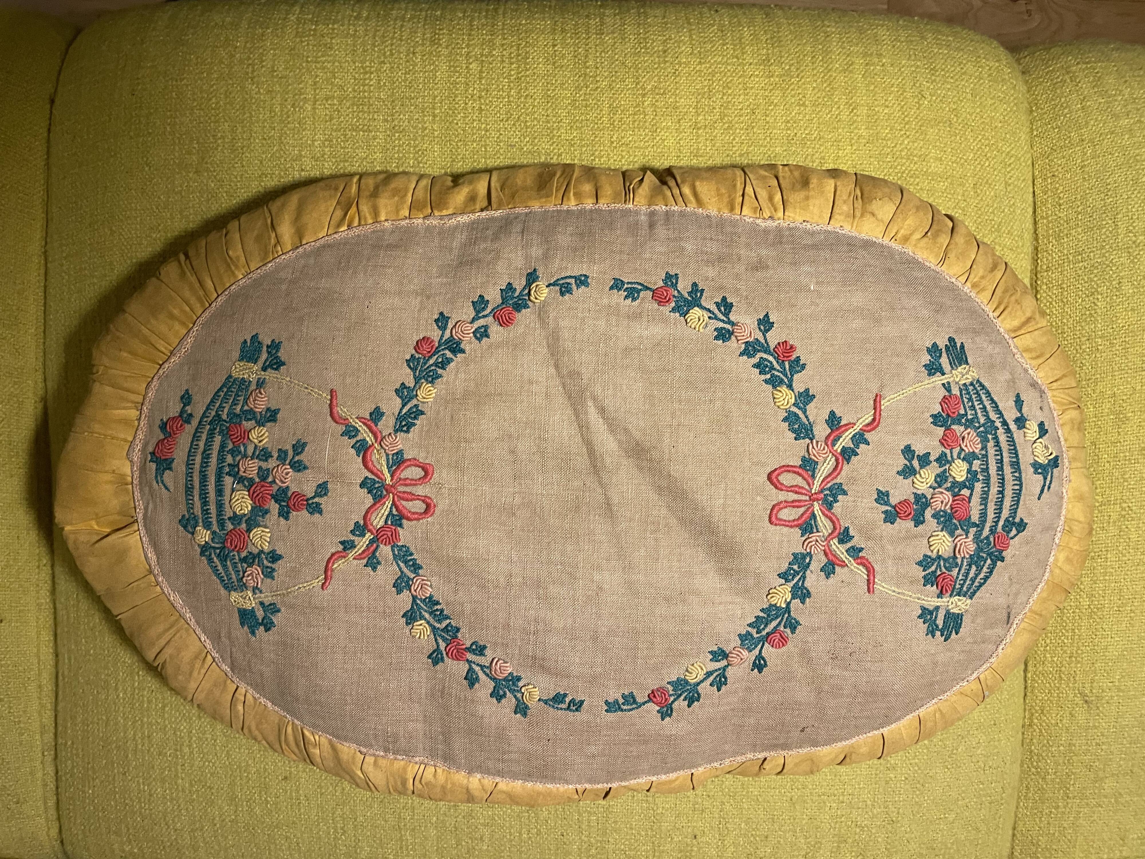 Hand-embroidered 1920s cushion