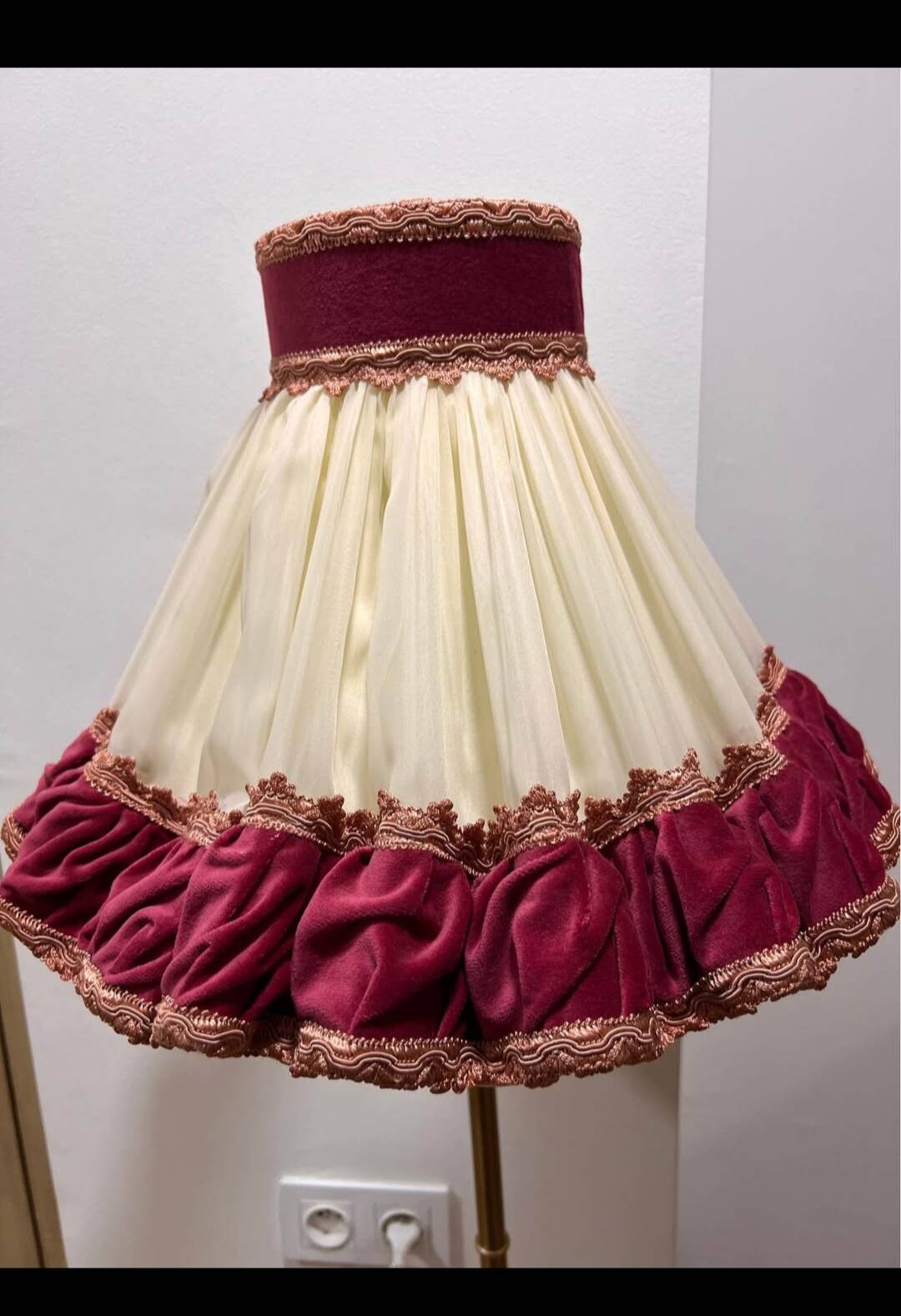 Unique floor lamp in Marie Antoinette style with a golden base.