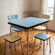 Vintage set from the 60s/70s: table, chairs, and marbled Formica stools.