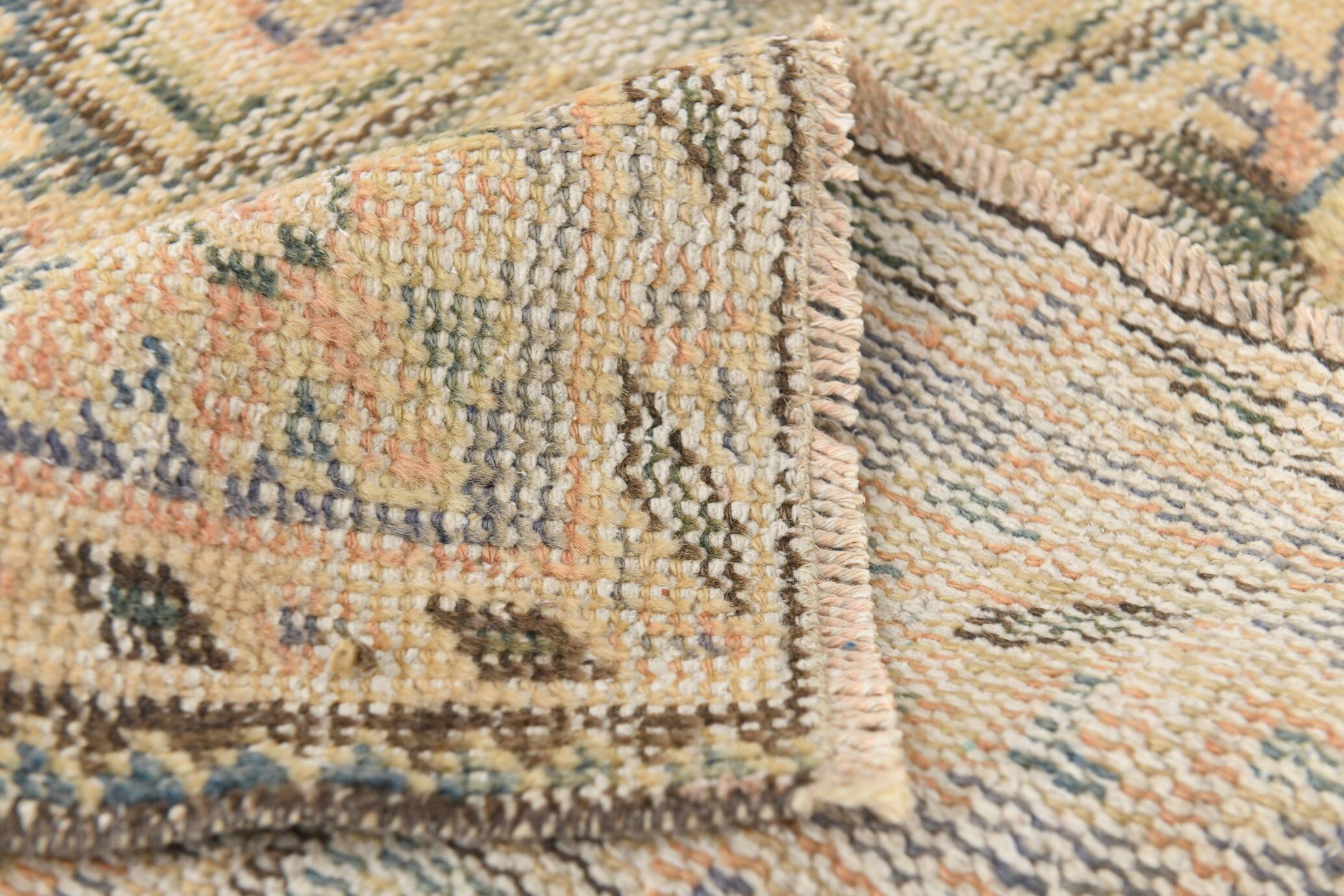 Tapis vintage en laine fait main, saumon doux et bleu marine, 183x264 cm