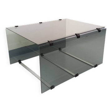 Table basse vintage en verre fumé, métal noir et fonte d’aluminium