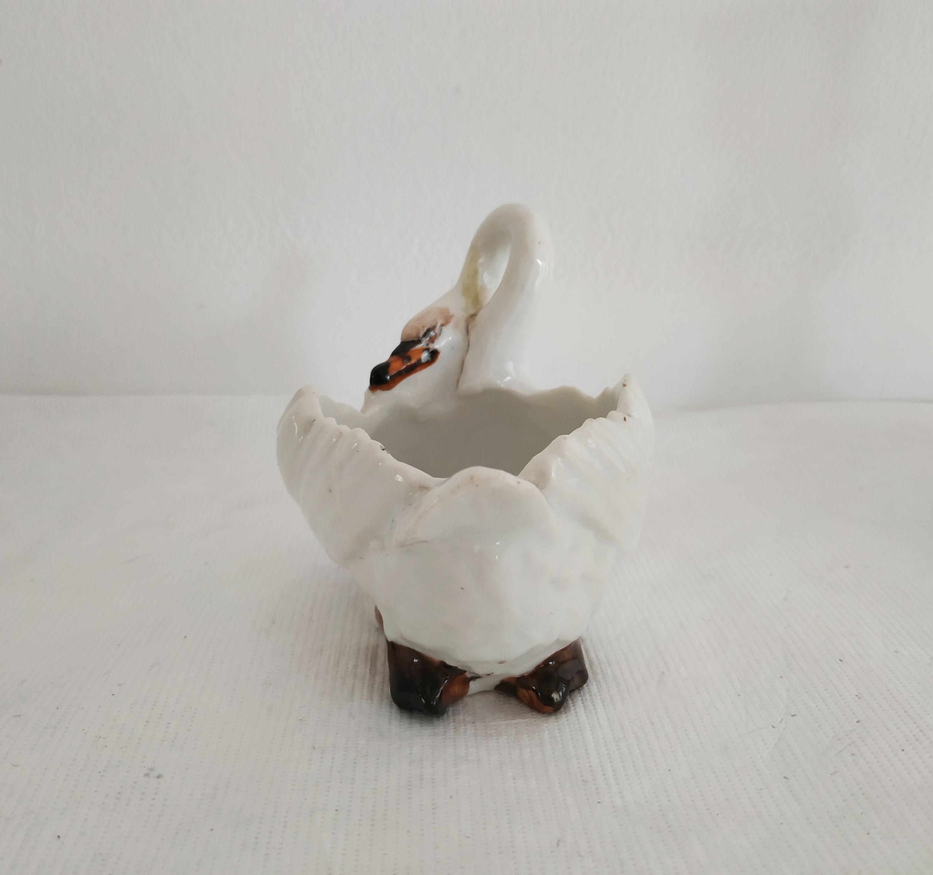 Mustard and salty swans, circa 1900