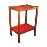 Serving in varnished chestnut and red leather